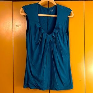 Dark turquoise sleeveless blouse
